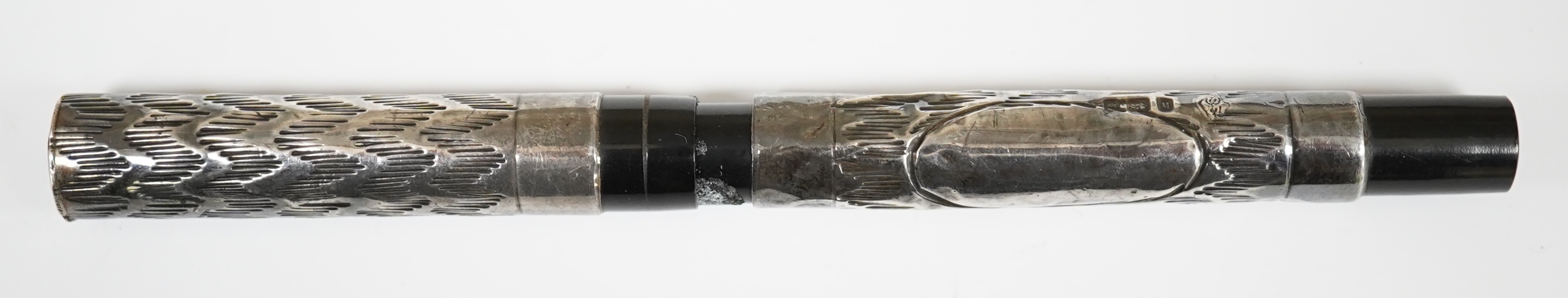 A fully hallmarked silver Eyedropper, with unusual pattern, c.1923, London